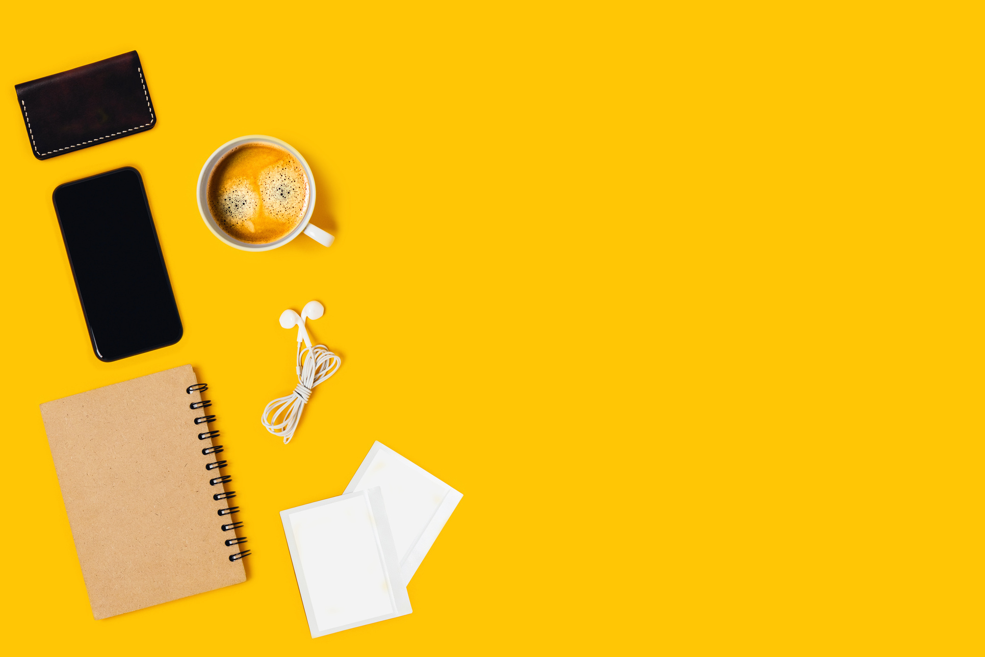 Coffee and Office Essentials Flatlay on Yellow Background
